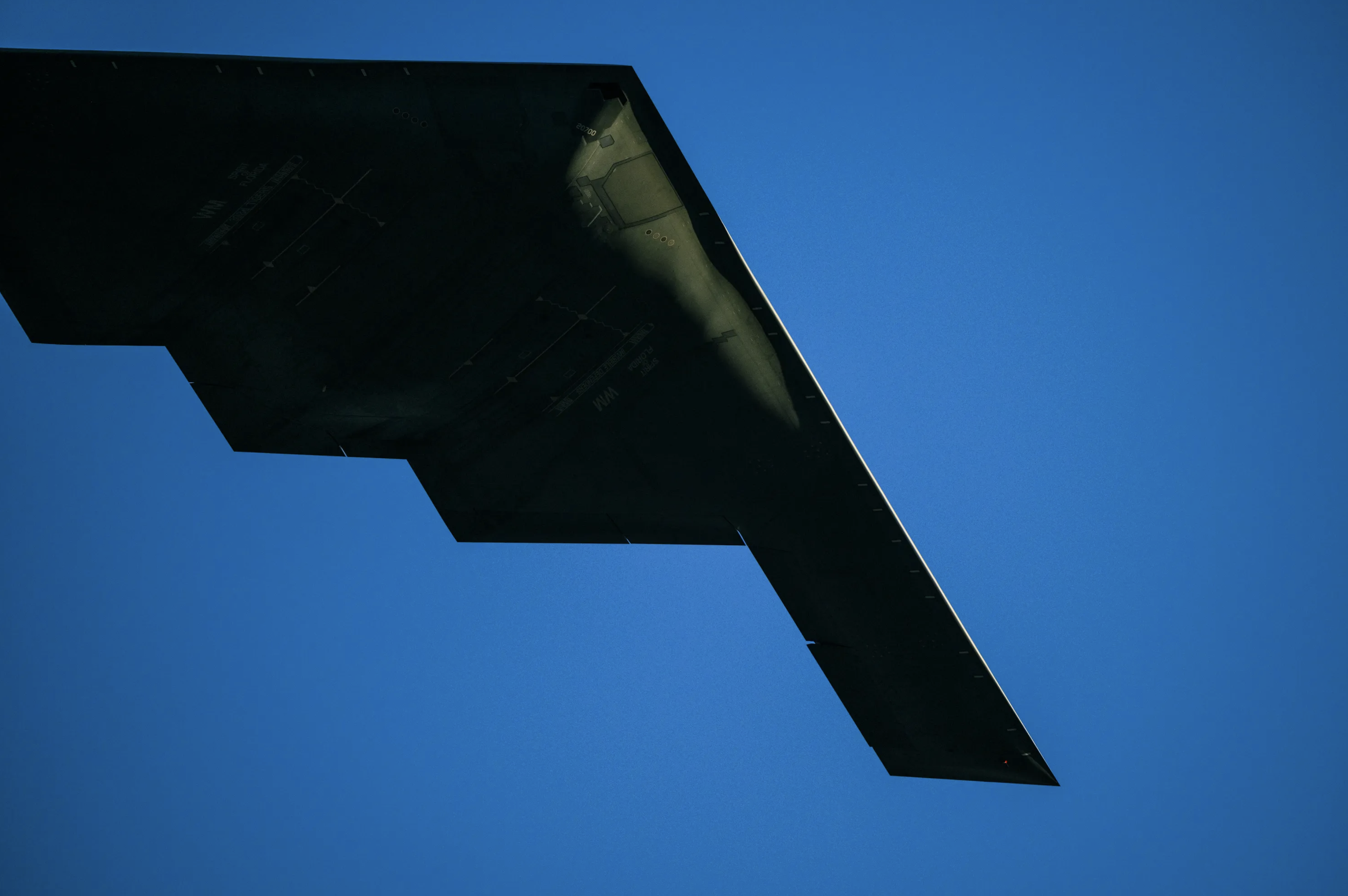 It's the bomber’s belly that struck Iran, shown up close by the White House on the day of the United States’ 250th anniversary, at the same moment when crowds march before Khamenei’s coffin in Tehran. Official White House photo.