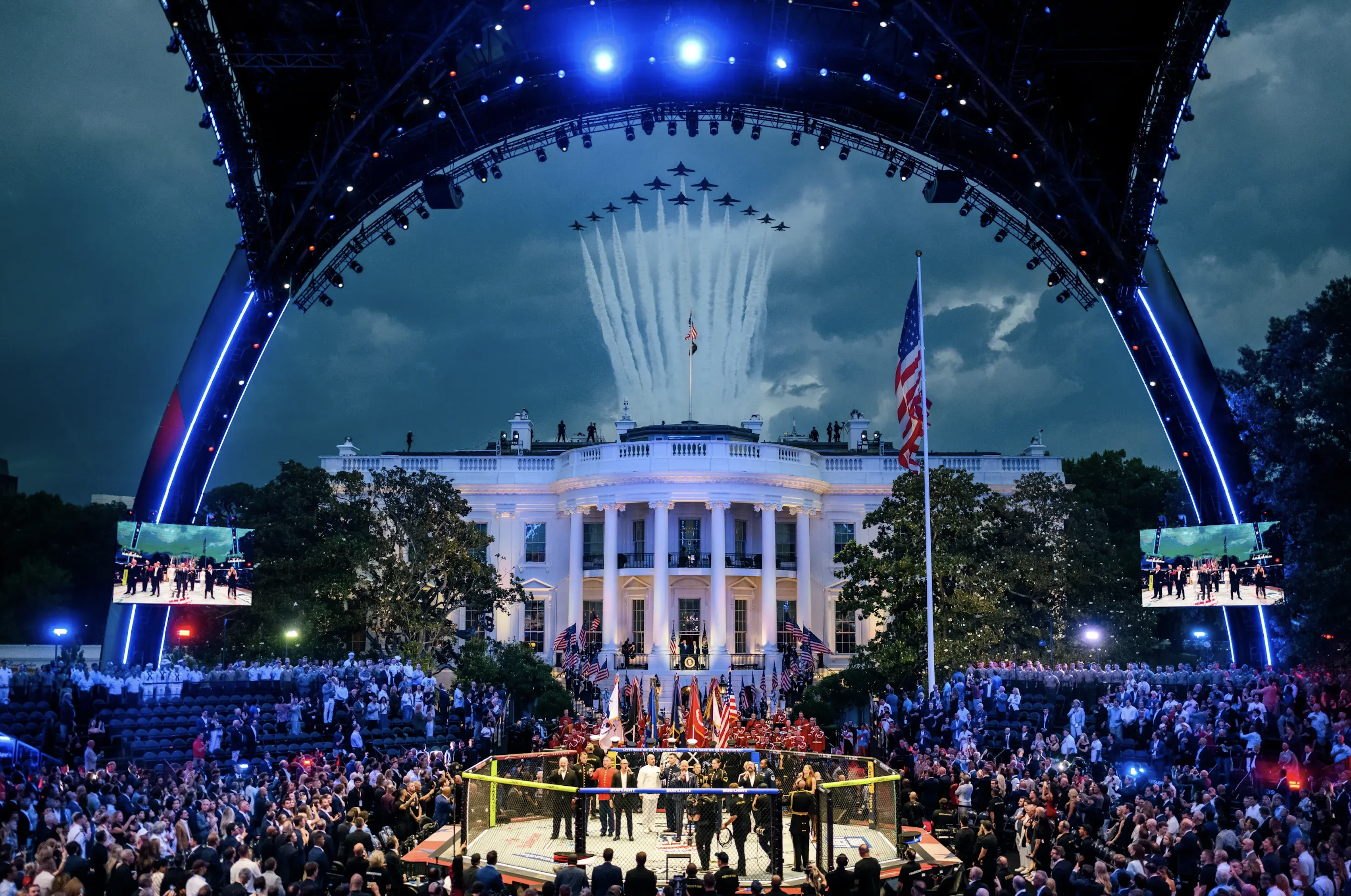 The UFC octagon set on the White House South Lawn, beneath a monumental stage arch, as an aerial formation flies over the presidential residence, during the fight organized for the 250th anniversary of the United States. White House official photo