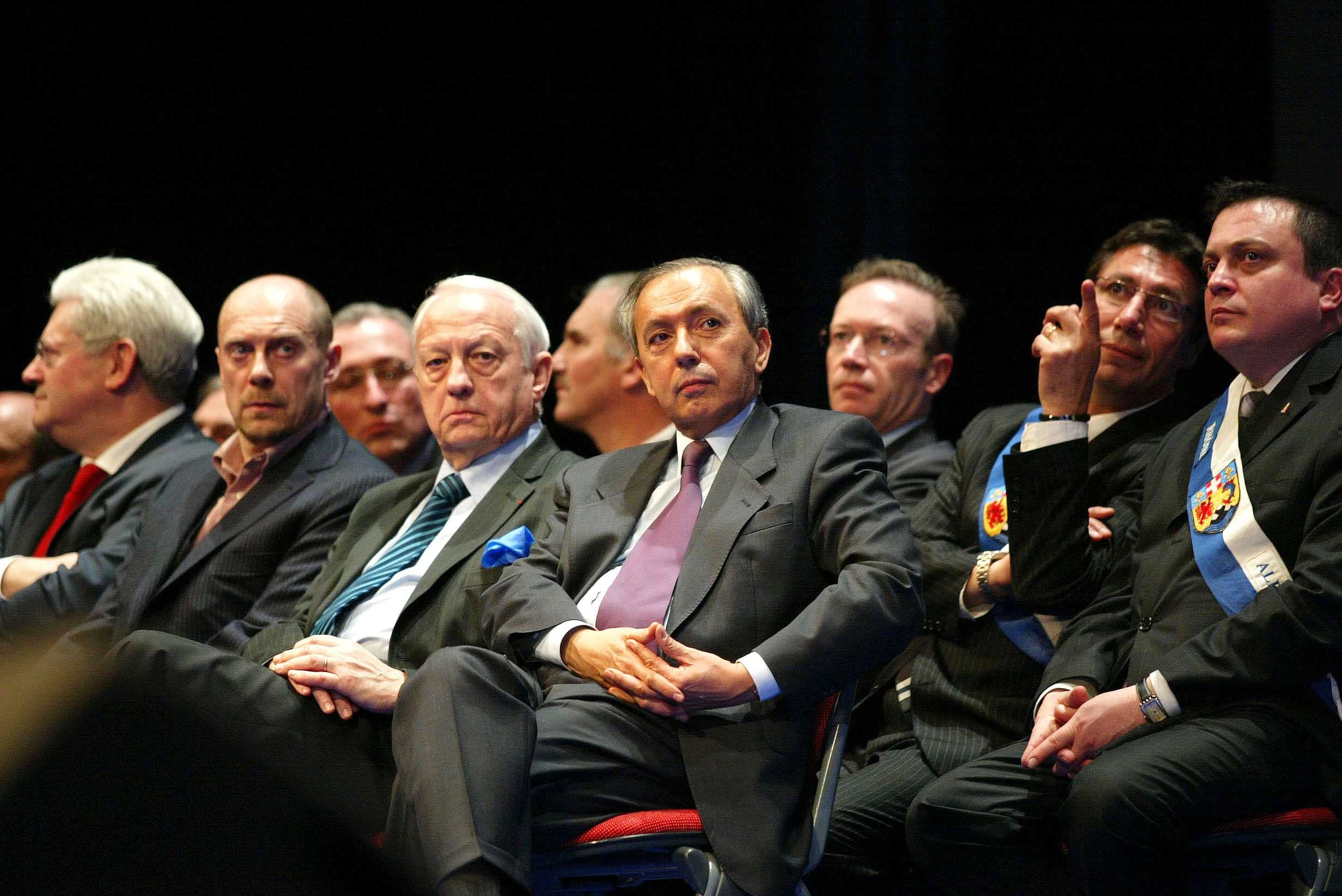 Alain Soral, on the left, is present at a Front National electoral meeting in Lyon among other party cadres, March 11, 2007.